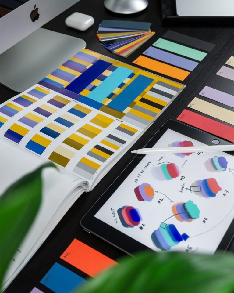 logo designs and color codes on paper