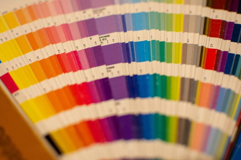 color sheets laid out on desk