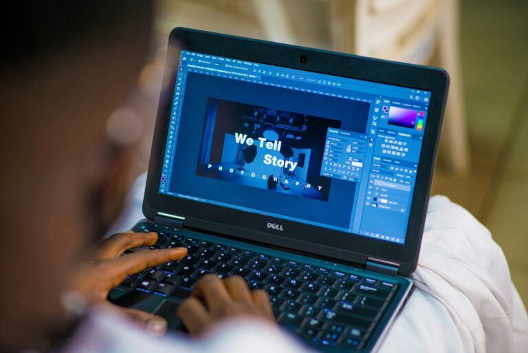 person editing on computer